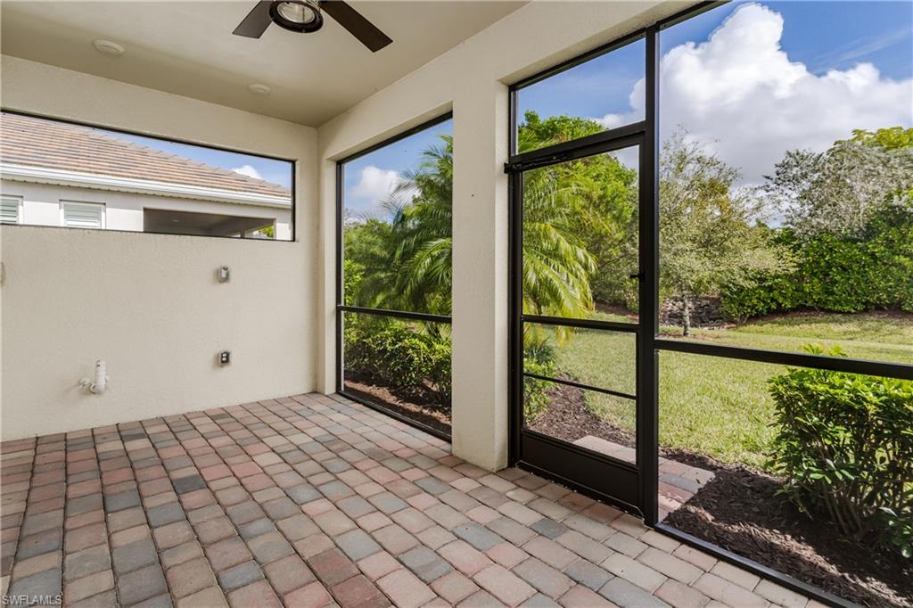 14643 Stillwater Way Naples, FL 34114 - Photo 30 of 50 a view of a glass door and an entryway
