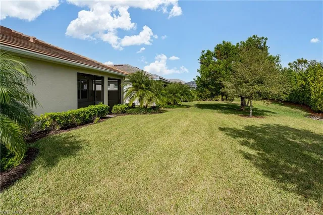 a view of a backyard with garden