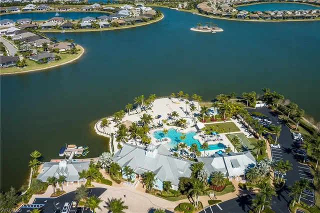 an aerial view of a city and lake
