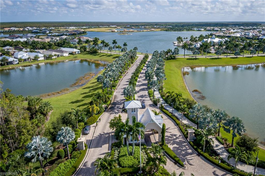 14643 Stillwater Way Naples, FL 34114 - Photo 48 of 50 an aerial view of a city and lake