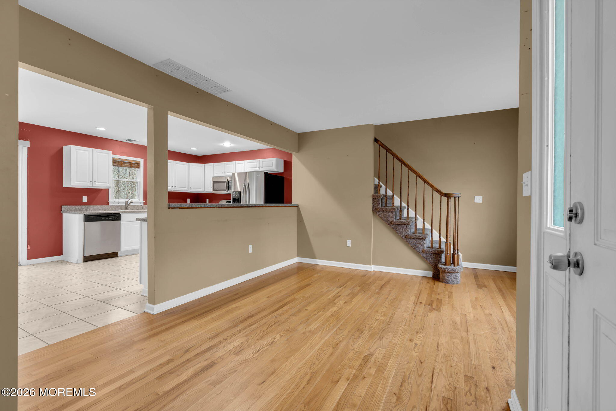 9 Forecastle Way Waretown, NJ 08758 - Photo 6 of 51 a view of a kitchen with wooden floor and a kitchen
