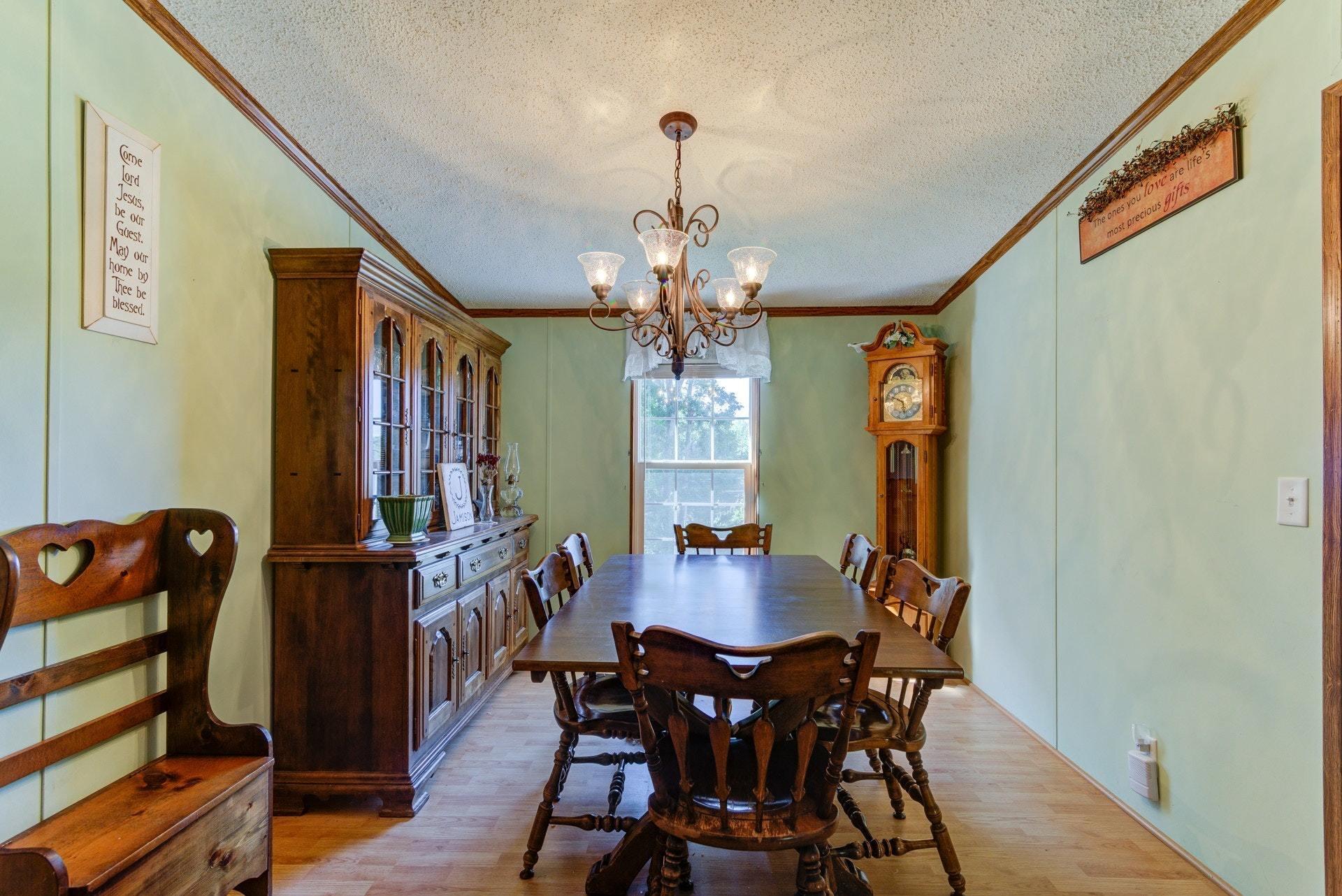1383 6 Mile Post Road Callaway, VA 24067 - Photo 16 of 30 a view of a dining room with furniture and window