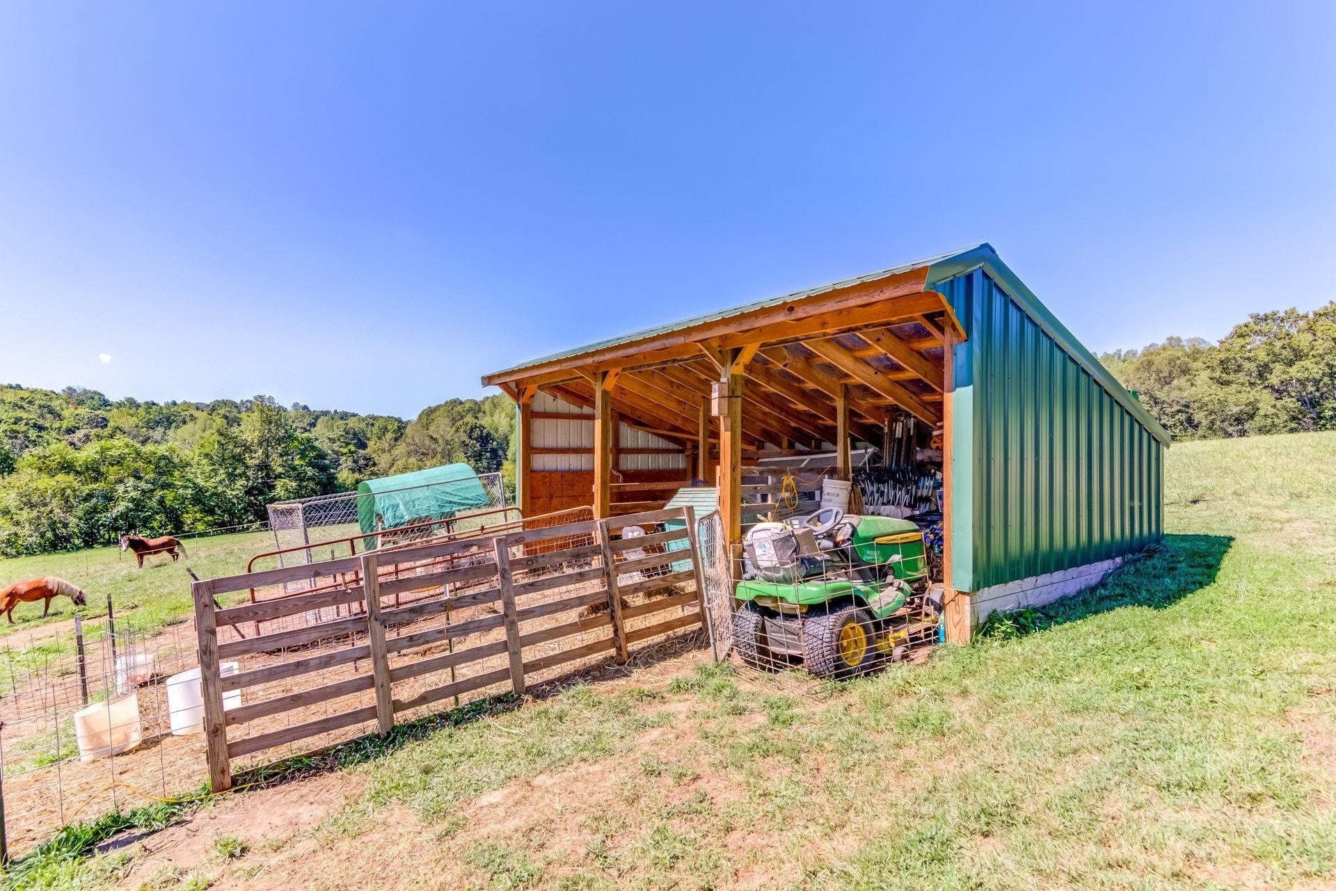 1383 6 Mile Post Road Callaway, VA 24067 - Photo 3 of 30 a view of a house with a wooden fence