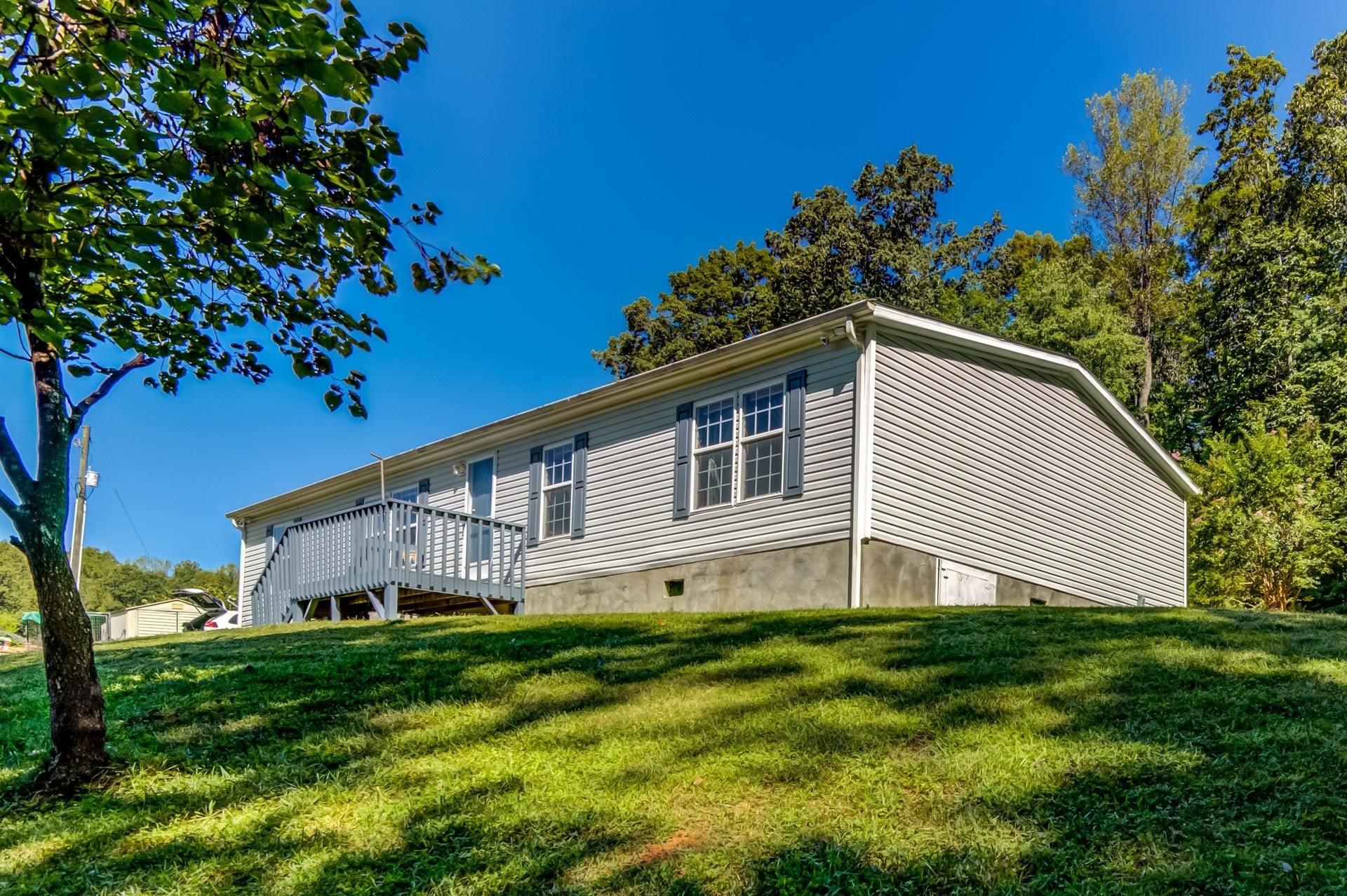 1383 6 Mile Post Road Callaway, VA 24067 - Photo 24 of 30 a house view with a garden space