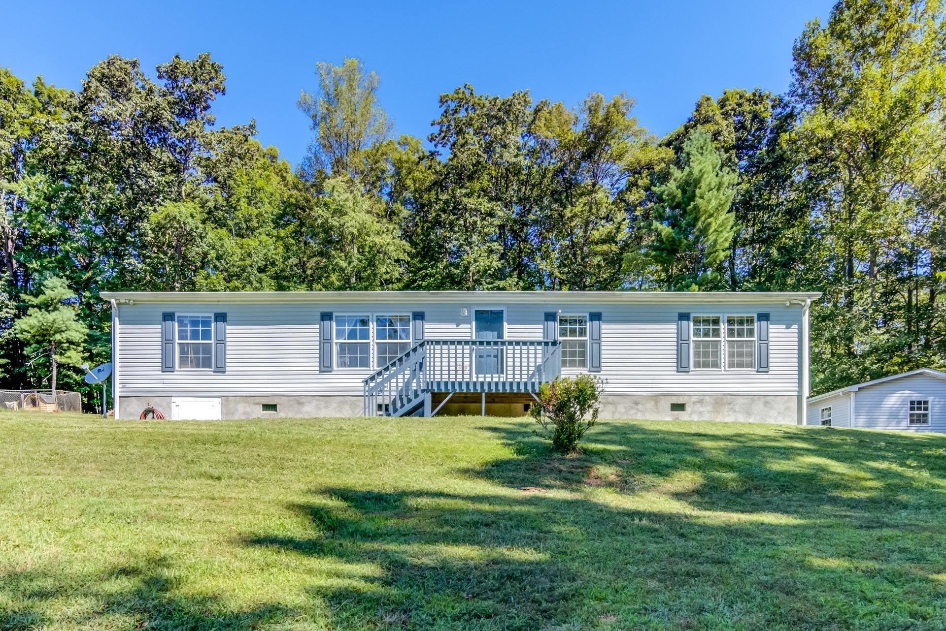 1383 6 Mile Post Road Callaway, VA 24067 - Photo 28 of 30 a house view with a sitting space and garden