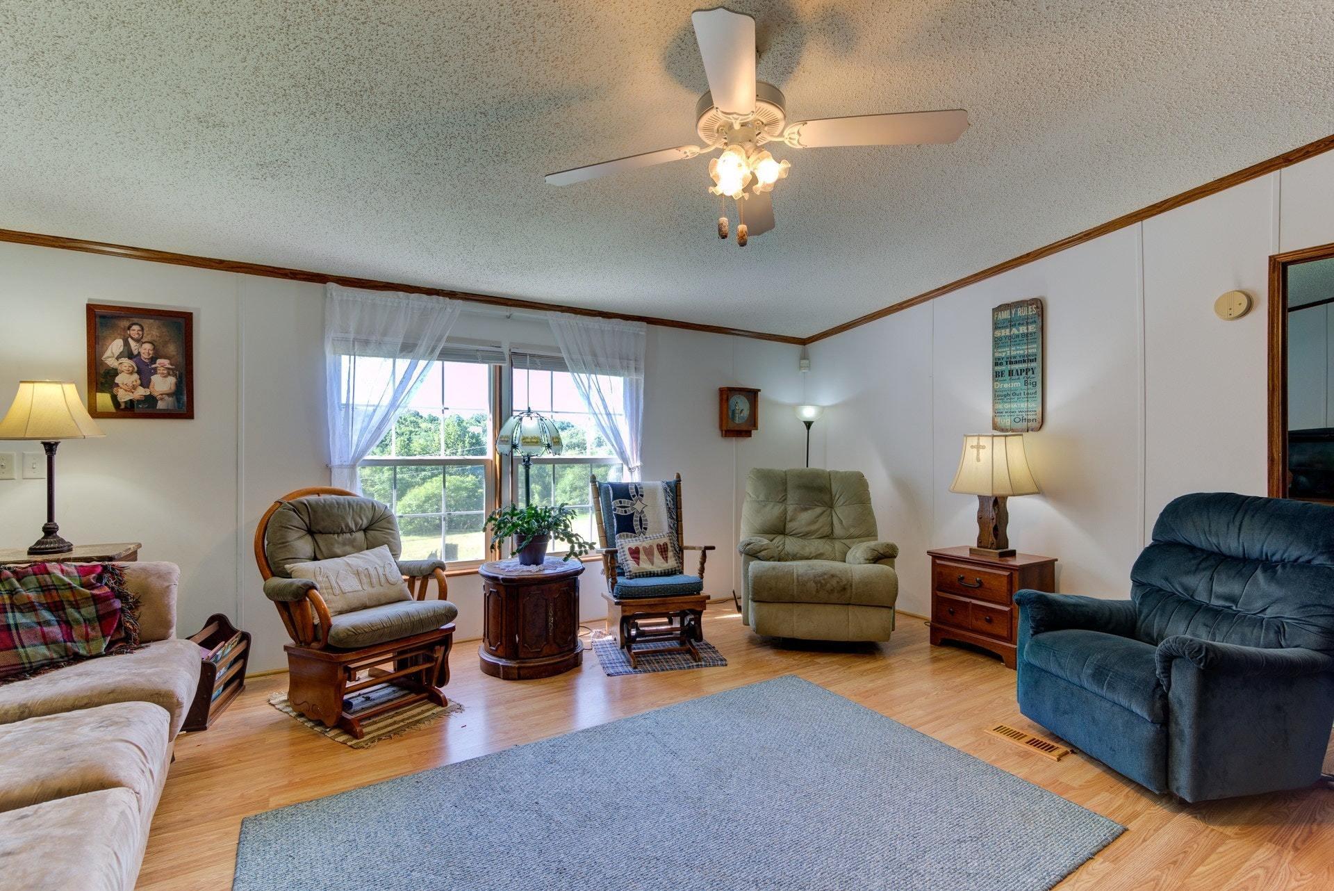 1383 6 Mile Post Road Callaway, VA 24067 - Photo 6 of 30 a living room with furniture and a large window