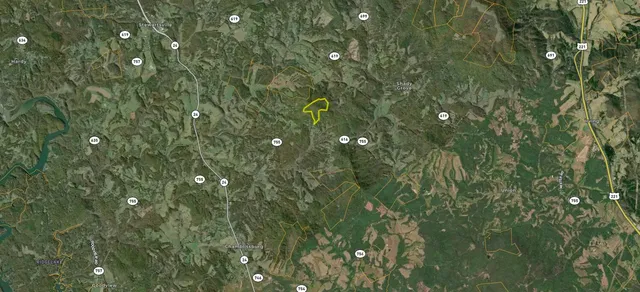 a view of houses with green space and sink