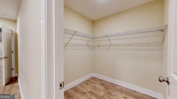 a view of a room with racks on the wall