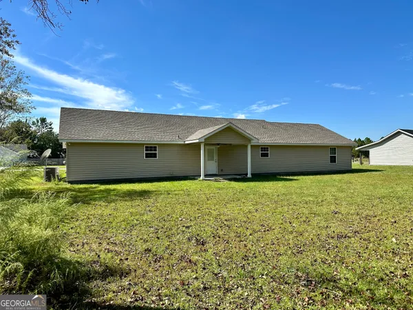 a house view with a garden space