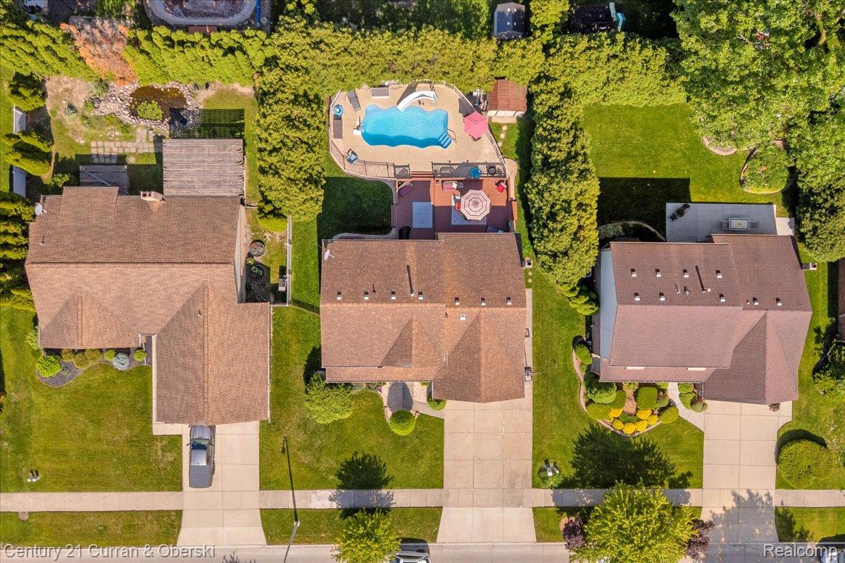 21439 Hall Road Trenton, MI 48183 - Photo 28 of 35 Aerial view showcasing residential properties with uniform brown shingle roofing