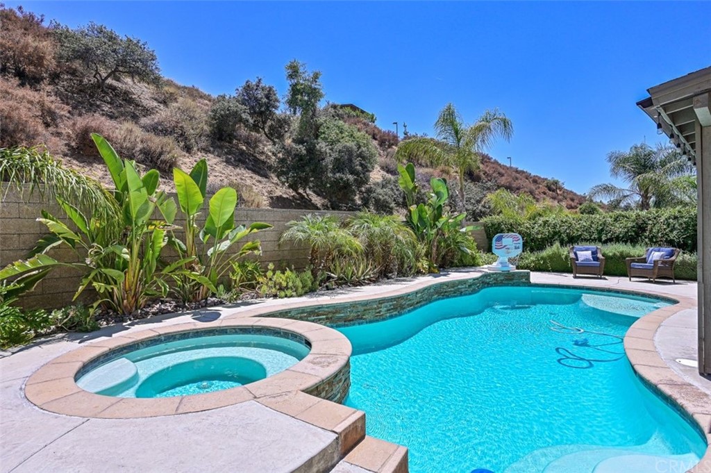 33915 Pinehurst Drive Yucaipa, CA 92399 - Photo 28 of 33 a view of a swimming pool with a yard