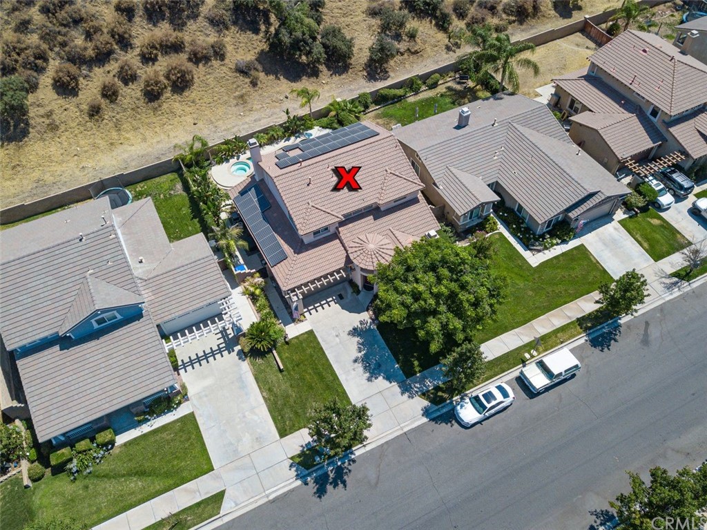 33915 Pinehurst Drive Yucaipa, CA 92399 - Photo 30 of 33 an aerial view of a house with a garden and street view