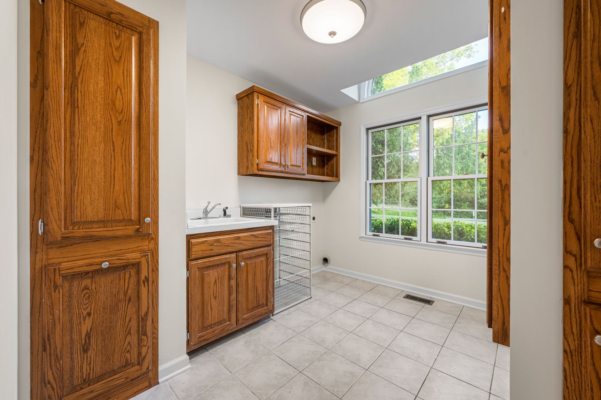 205 Normandy Road Wartrace, TN 37183 - Photo 33 of 70 a bathroom with a granite countertop sink and a mirror