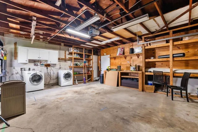 a view of a storage & utility room with washer and dryer