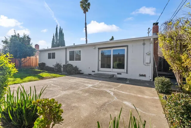 a house view with a garden space