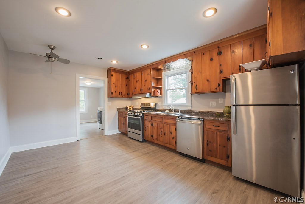 534 Old Bermuda Hundred Road Chester, VA 23836 - Photo 19 of 38 a kitchen with granite countertop a refrigerator stove top oven and cabinets