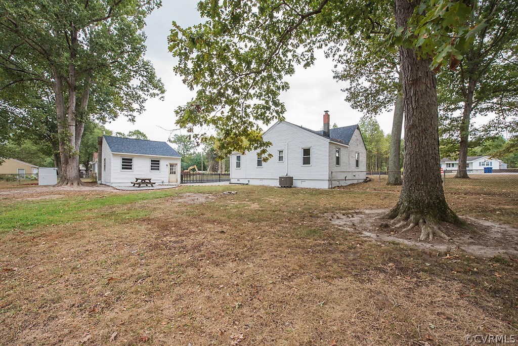 534 Old Bermuda Hundred Road Chester, VA 23836 - Photo 29 of 38 a house with trees in front of it