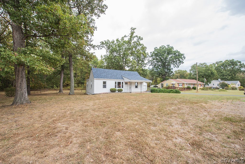 534 Old Bermuda Hundred Road Chester, VA 23836 - Photo 35 of 38 a house with trees in front of it