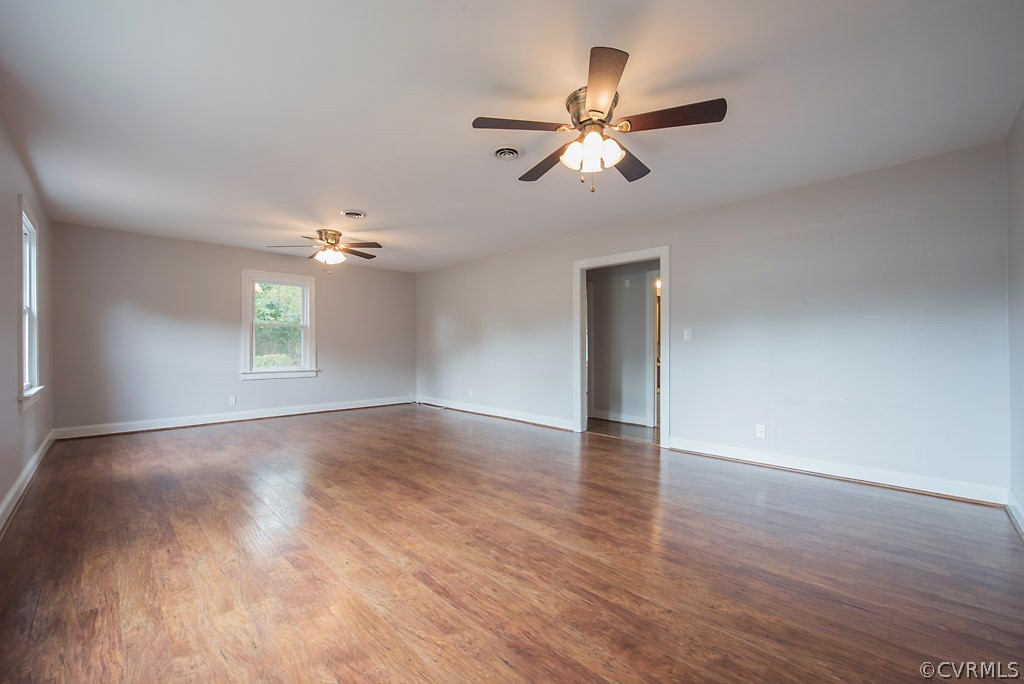 534 Old Bermuda Hundred Road Chester, VA 23836 - Photo 7 of 38 a view of an empty room with wooden floor and a window