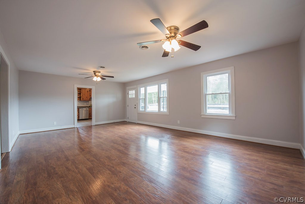 534 Old Bermuda Hundred Road Chester, VA 23836 - Photo 8 of 38 a view of an empty room with a window and wooden floor
