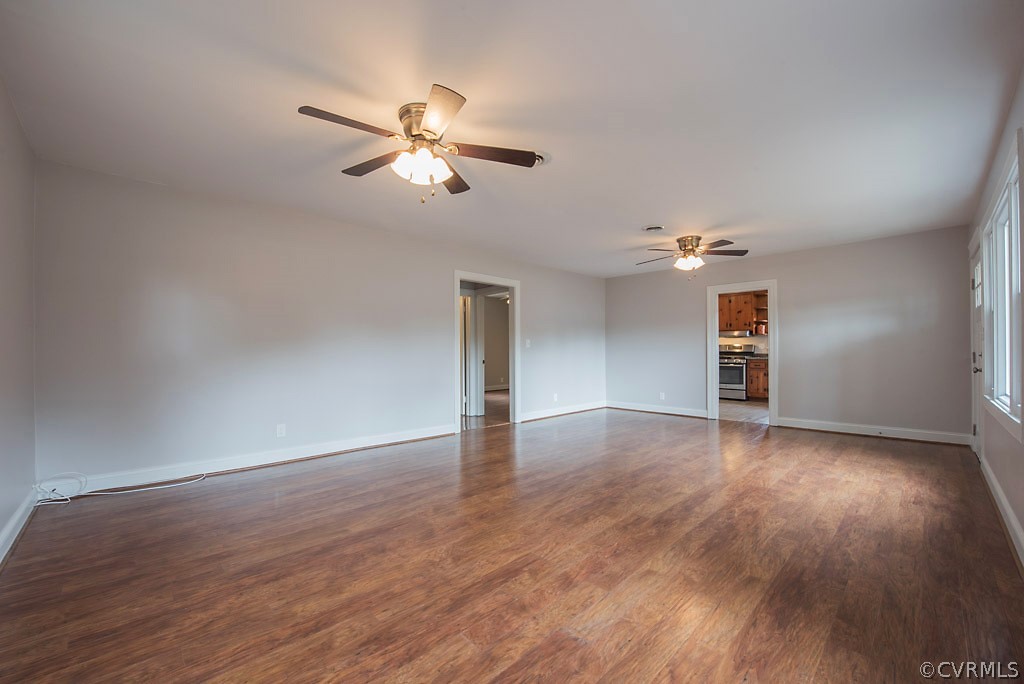 534 Old Bermuda Hundred Road Chester, VA 23836 - Photo 9 of 38 a view of empty room with wooden floor and ceiling fan