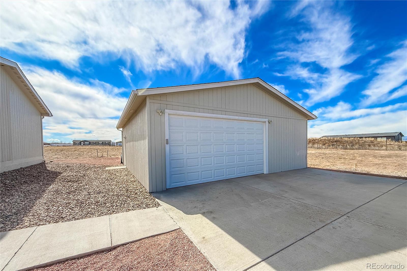 16412 Higgins Avenue Fort Lupton, CO 80621 - Photo 22 of 27 a view of backyard with barn