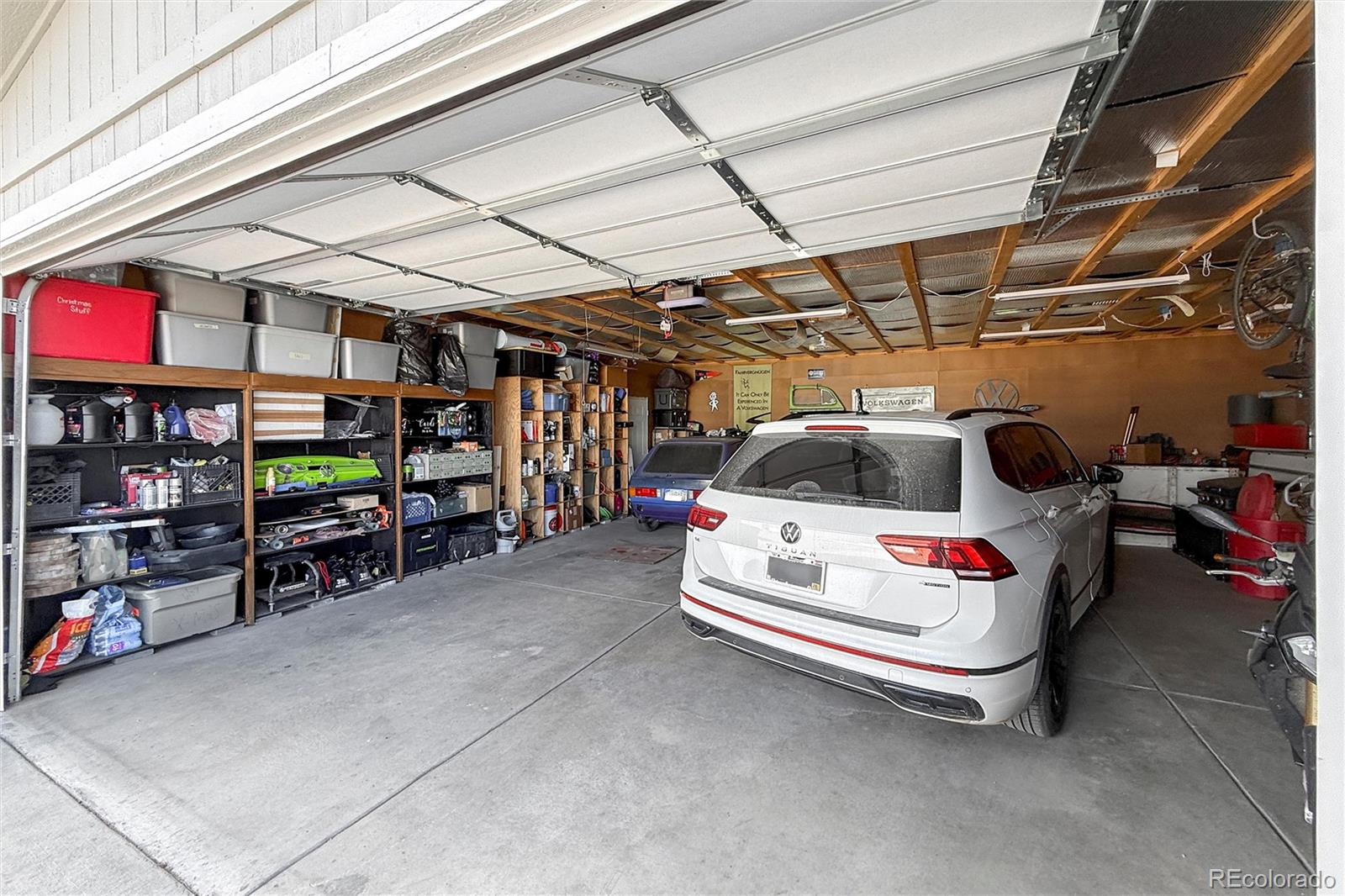 16412 Higgins Avenue Fort Lupton, CO 80621 - Photo 23 of 27 a white car parked in a garage