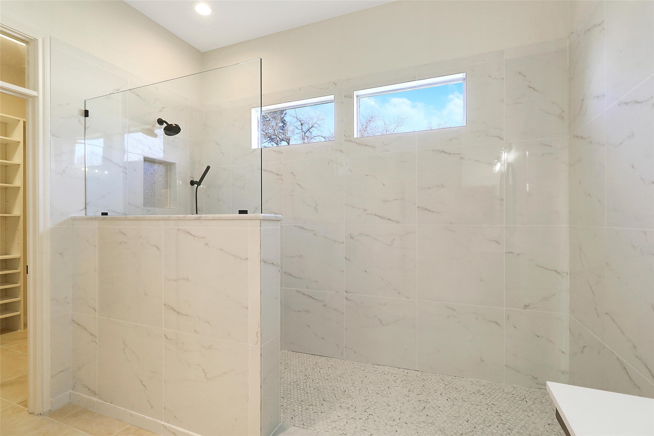 109 Sunflower Street Georgetown, TX 78633 - Photo 11 of 19 Newly updated primary bath with large walk-in shower.
