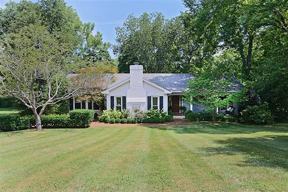 118 Cheek Road Nashville, TN 37205 - Photo 1 of 19 a front view of a house with a yard