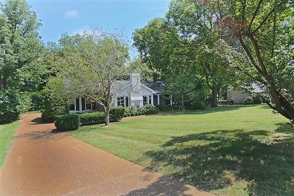 118 Cheek Road Nashville, TN 37205 - Photo 2 of 19 a front view of a house with yard and green space