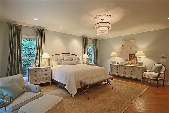 118 Cheek Road Nashville, TN 37205 - Photo 14 of 19 a bedroom with a bed and a chandelier