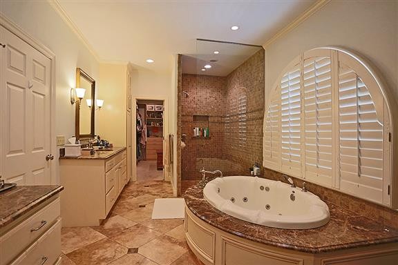 118 Cheek Road Nashville, TN 37205 - Photo 15 of 19 a bathroom with a tub sink and mirror