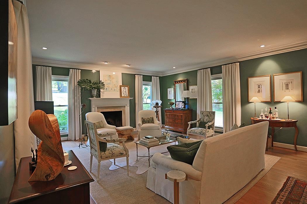 118 Cheek Road Nashville, TN 37205 - Photo 6 of 19 a living room with furniture a fireplace and a floor to ceiling window