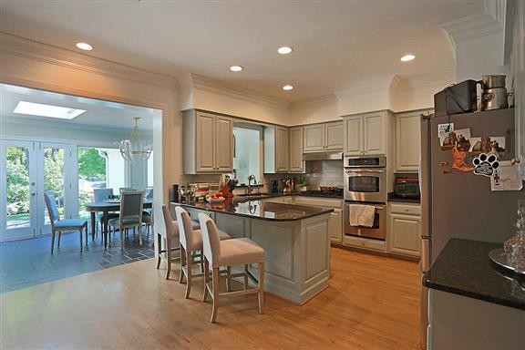 118 Cheek Road Nashville, TN 37205 - Photo 7 of 19 a kitchen with a sink stove and refrigerator