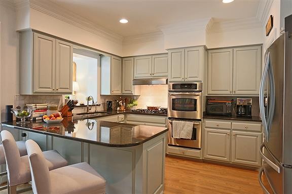 118 Cheek Road Nashville, TN 37205 - Photo 8 of 19 a kitchen with a sink appliances and cabinets