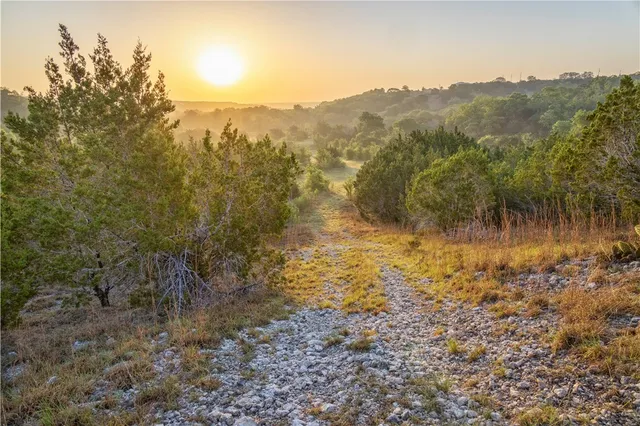 a view of a lake with mountains in the background
