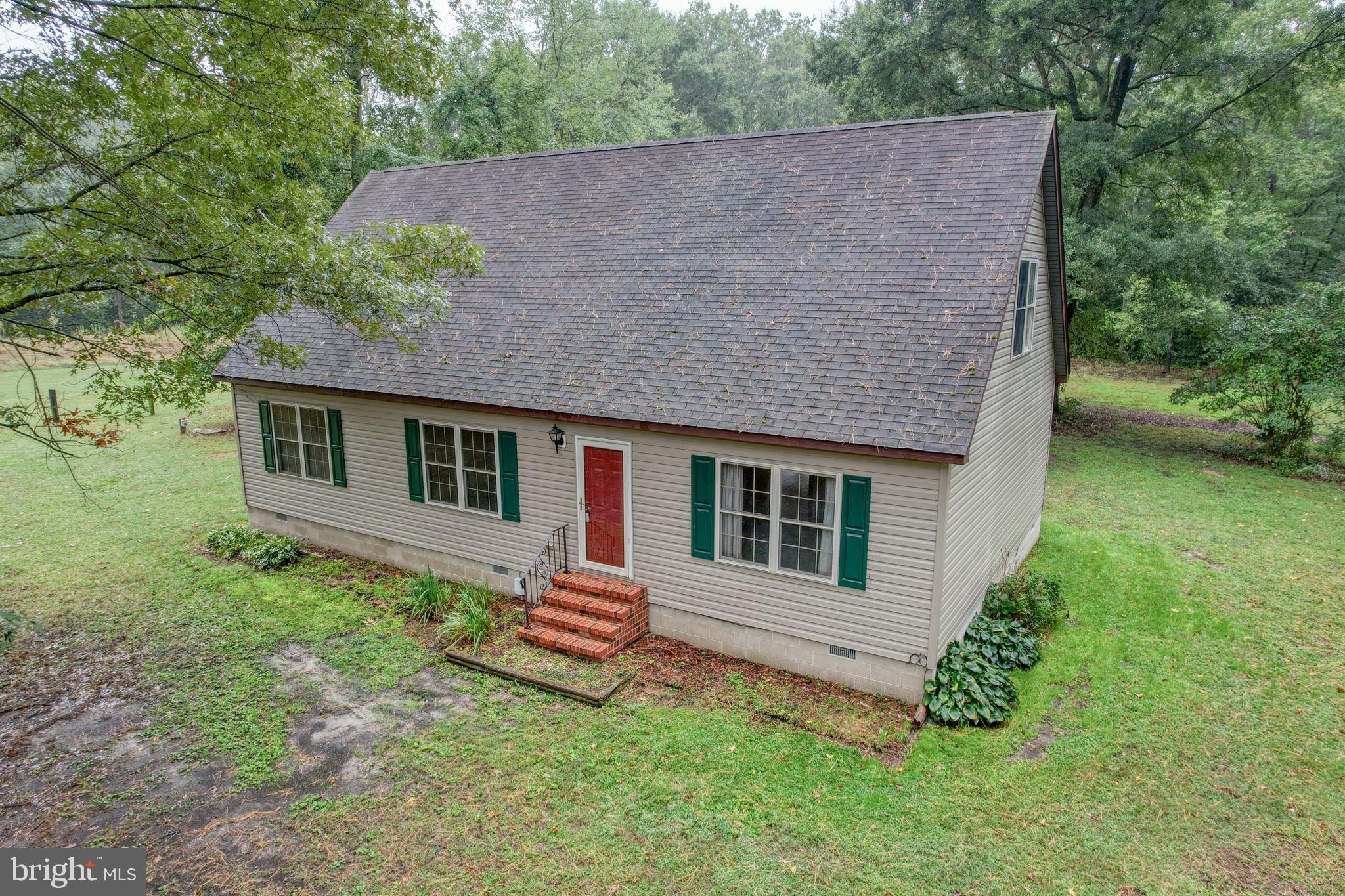 a house view with a garden space