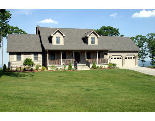 77 Burt Road Westhampton, MA 01027 - Photo 1 of 1 a front view of a house with a garden