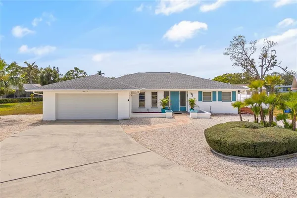 a view of a house with a swimming pool
