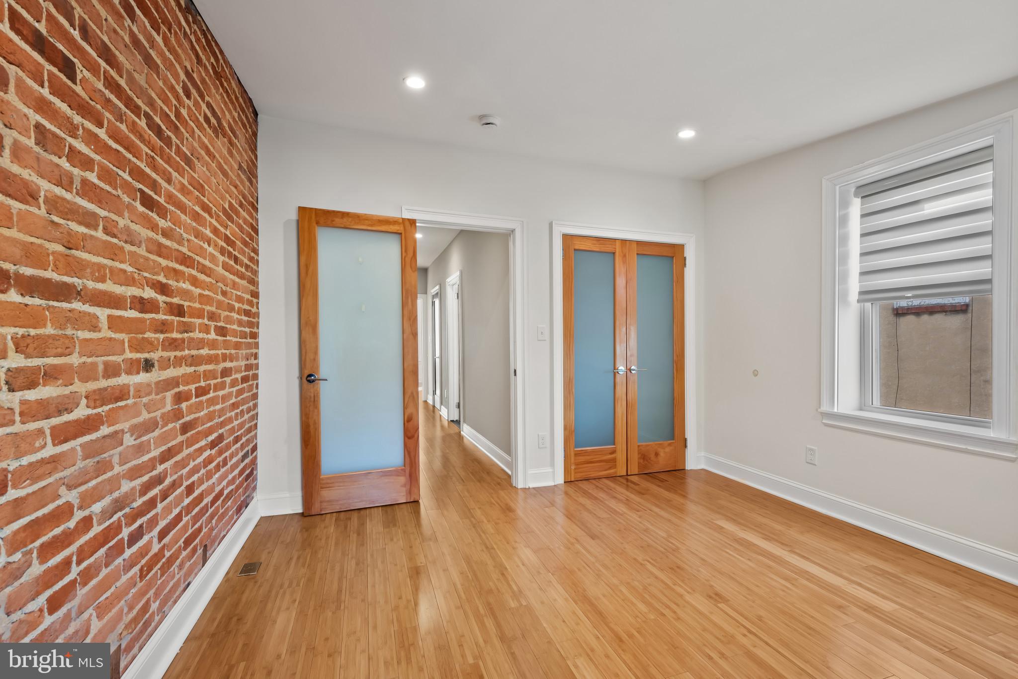 412 East Lanvale Street Baltimore, MD 21202 - Photo 13 of 28 Charming space with exposed brick accents.