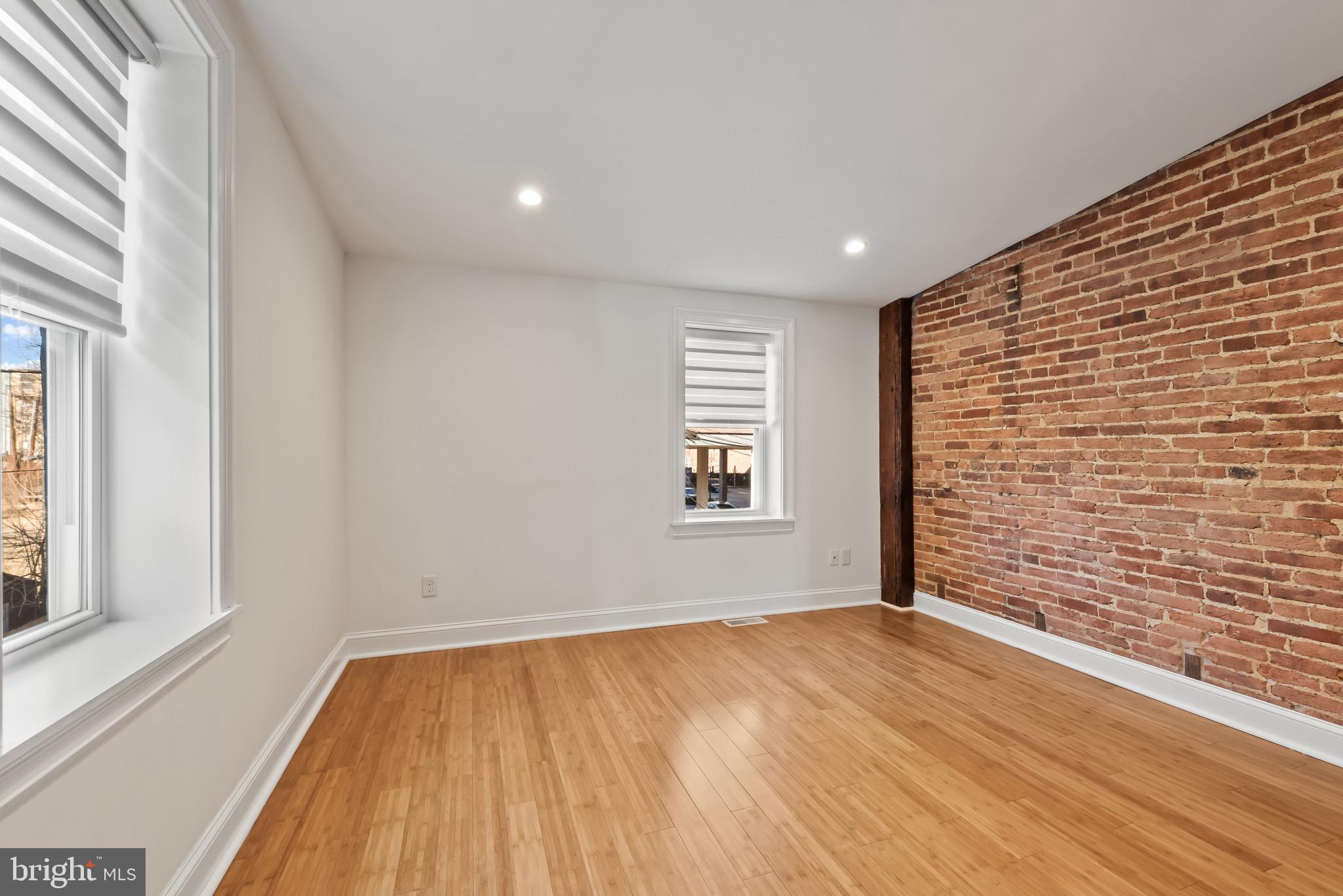 412 East Lanvale Street Baltimore, MD 21202 - Photo 15 of 28 Bright, airy space with exposed brick charm.
