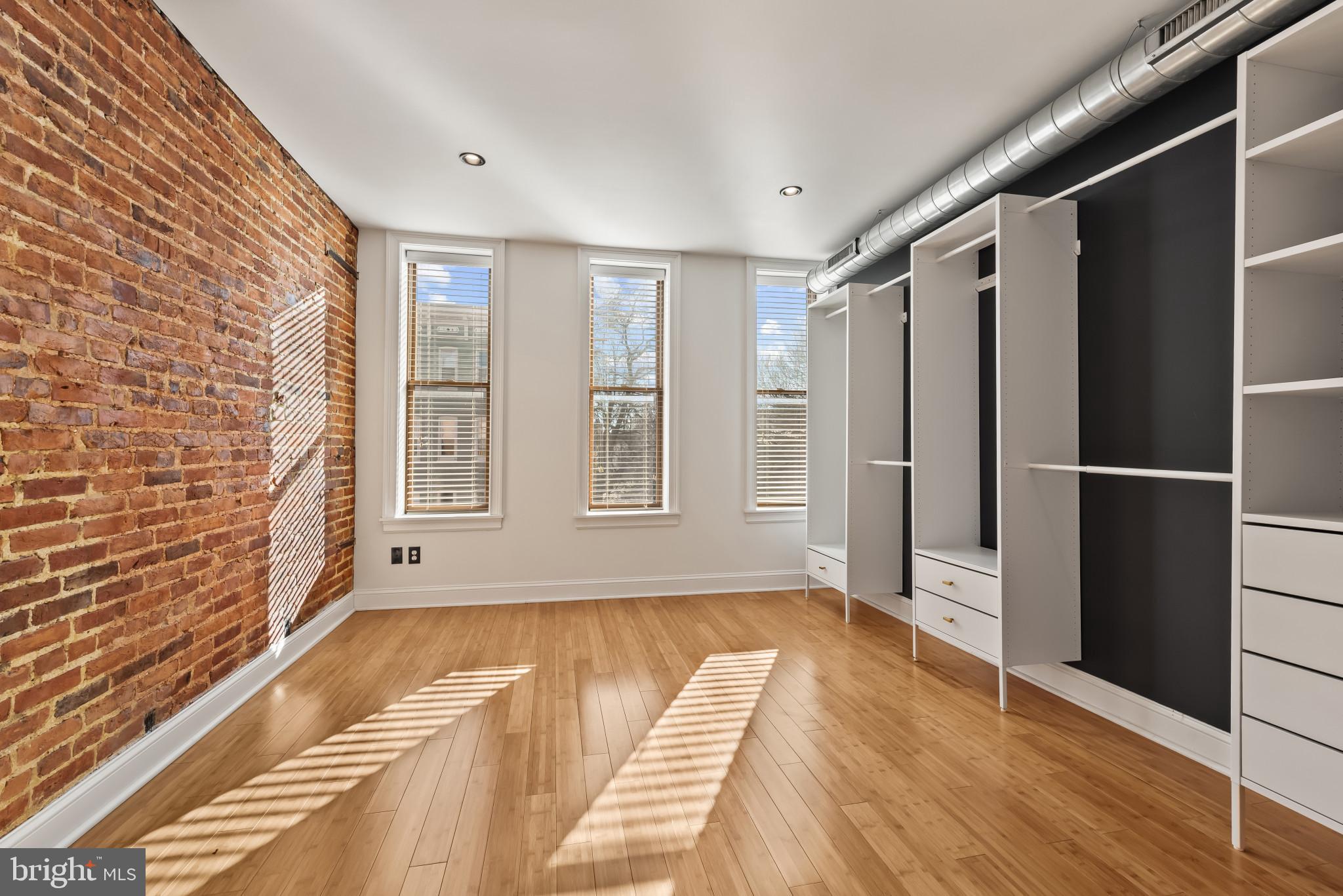 412 East Lanvale Street Baltimore, MD 21202 - Photo 16 of 28 Bright, airy space with exposed brick charm.