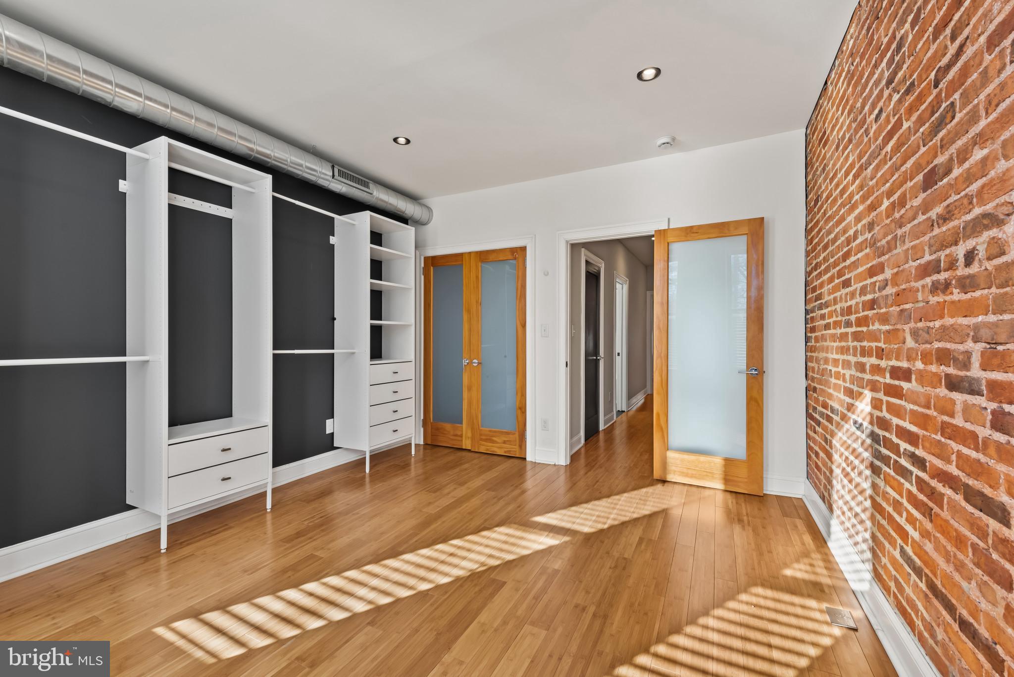 412 East Lanvale Street Baltimore, MD 21202 - Photo 17 of 28 Stylish space with exposed brick charm.