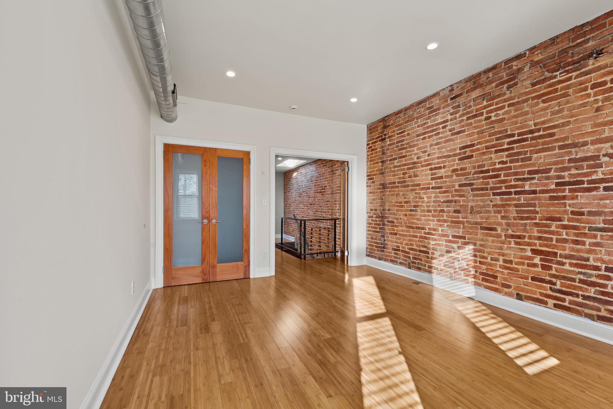 412 East Lanvale Street Baltimore, MD 21202 - Photo 23 of 28 Chic urban loft with exposed brick charm.