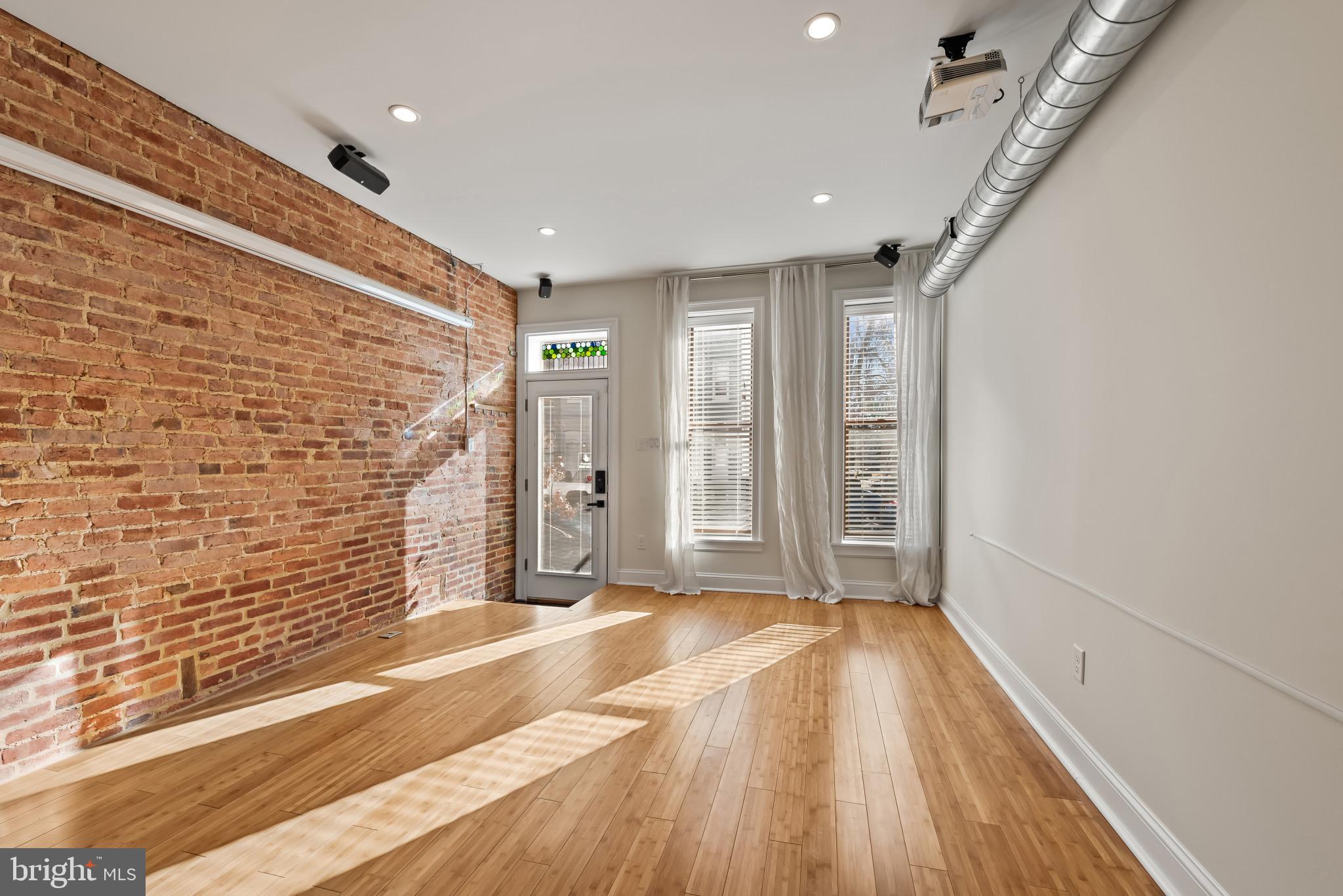 412 East Lanvale Street Baltimore, MD 21202 - Photo 3 of 28 Charming space with exposed brick accents.