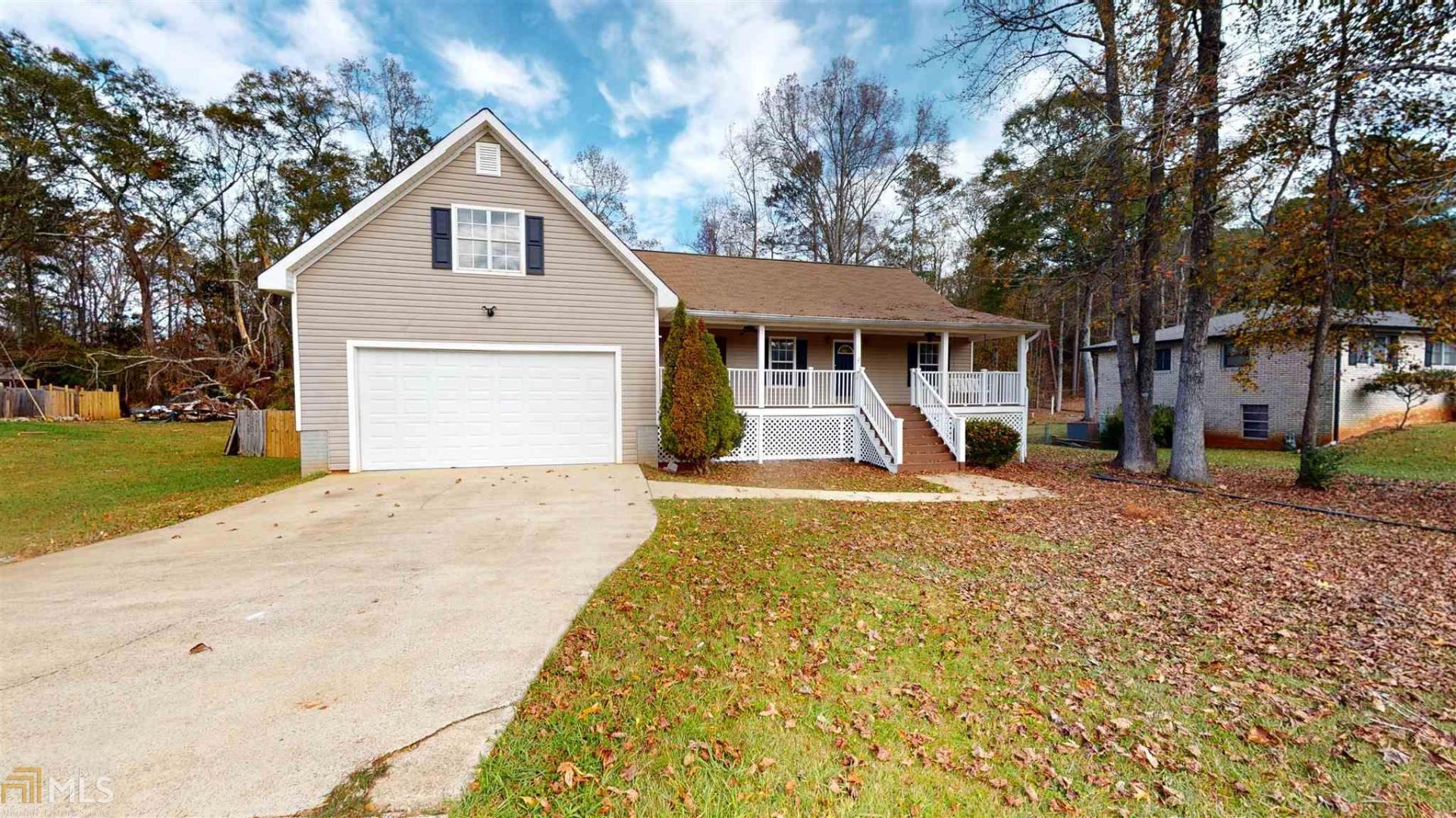 1257 Country Club Road Newnan, GA 30263 - Photo 1 of 1 a view of a house with a yard and large tree