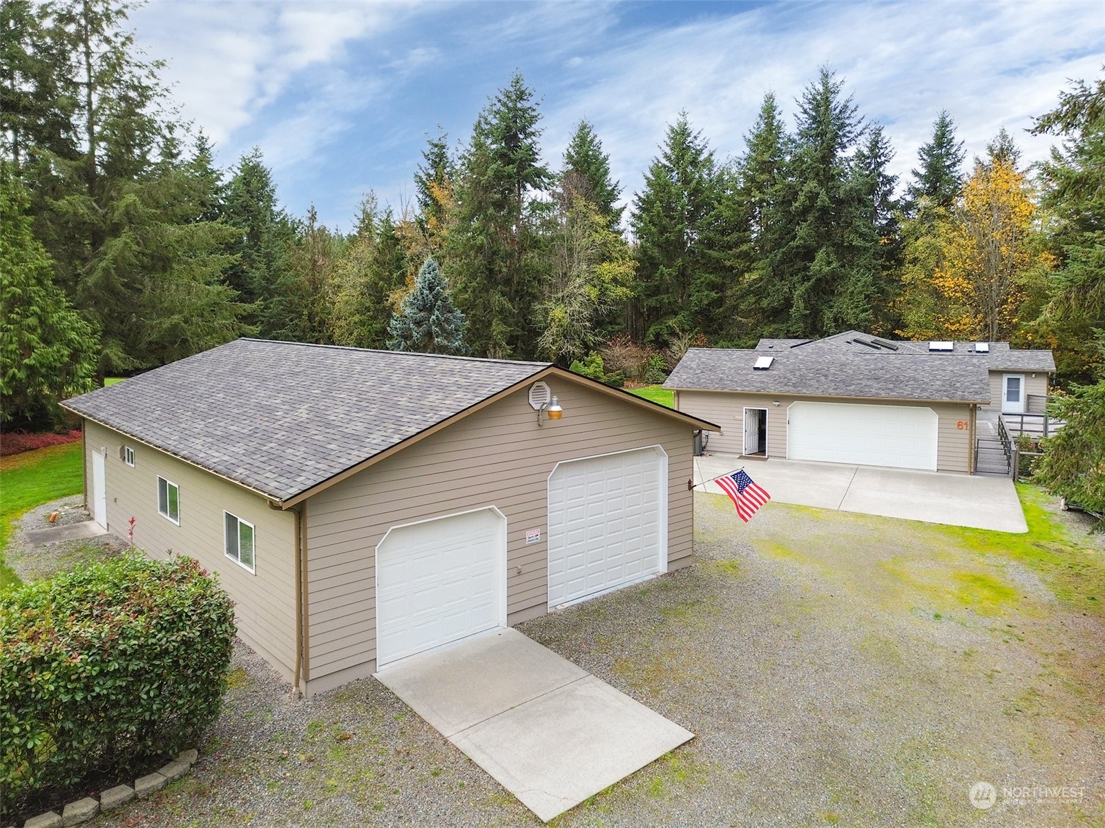 61 Sunny Dell Lane Sequim, WA 98382 - Photo 2 of 40 a aerial view of a house with a yard and garage