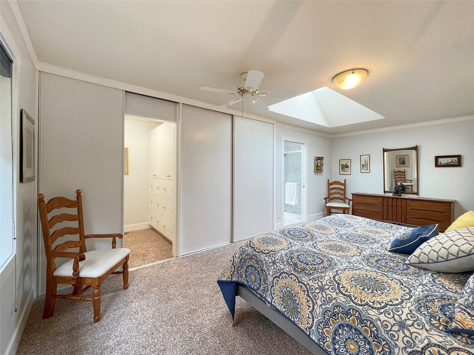 61 Sunny Dell Lane Sequim, WA 98382 - Photo 21 of 40 a bedroom with a bed and a couch