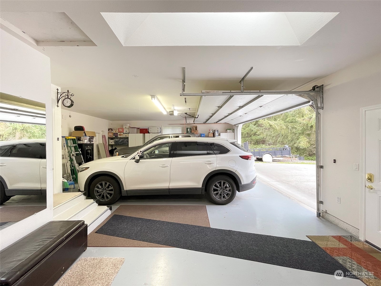 61 Sunny Dell Lane Sequim, WA 98382 - Photo 30 of 40 a view of a car in garage