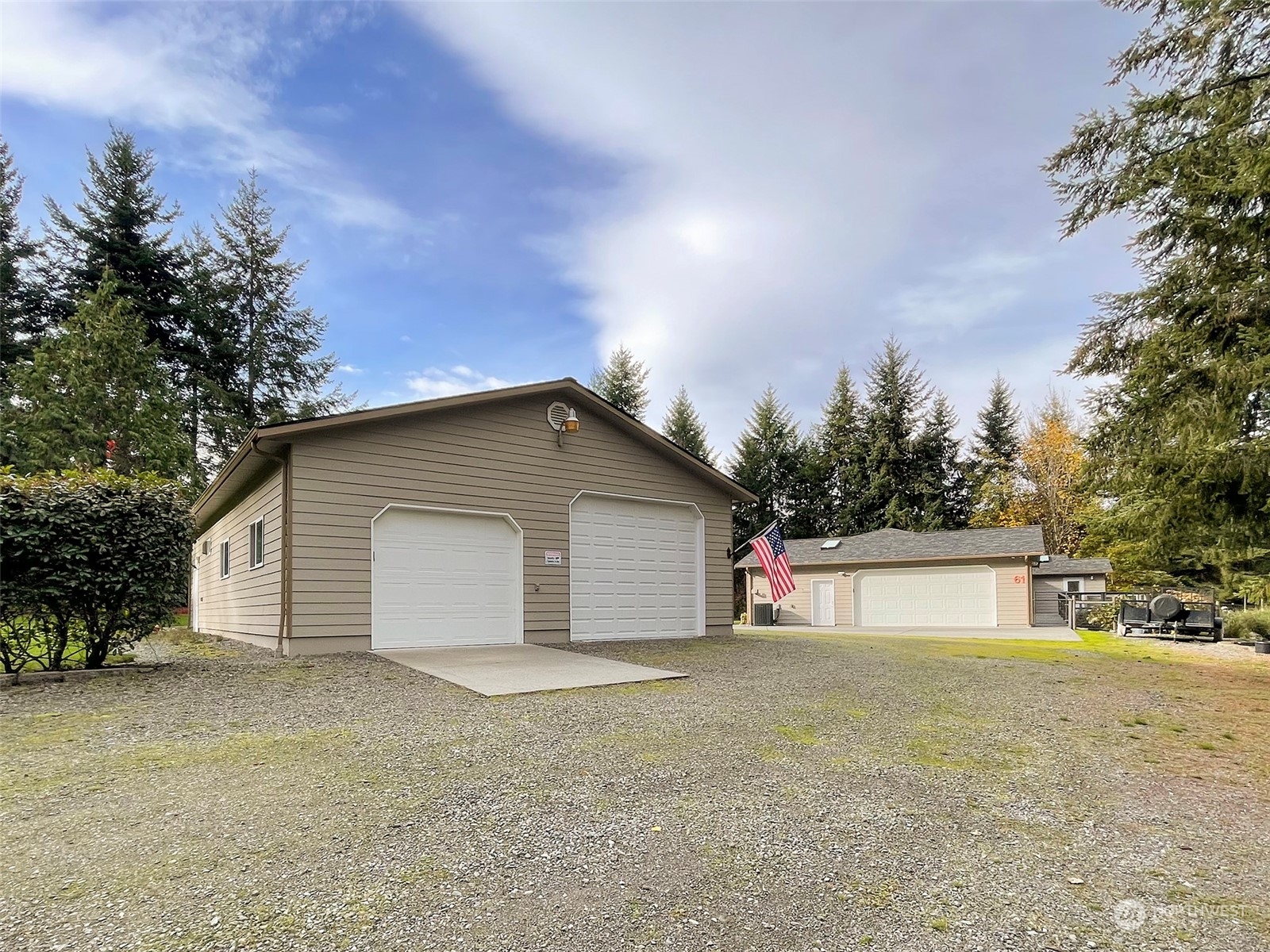 61 Sunny Dell Lane Sequim, WA 98382 - Photo 34 of 40 a view of garage and yard